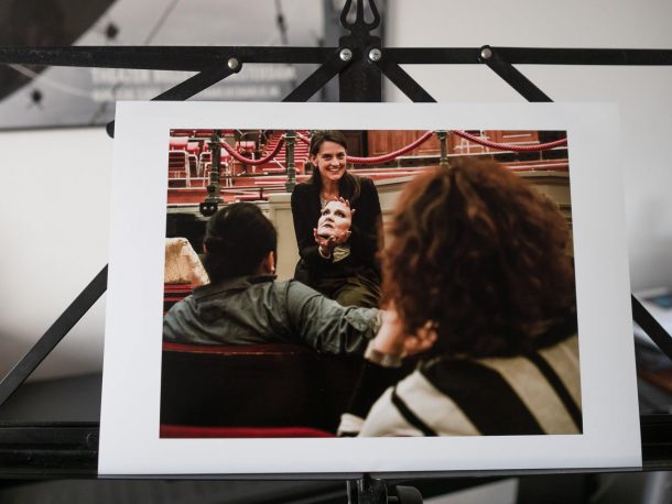 Print of opera director Caecilia Thunnissen showing the singers of Wagner's Lohengrin the mask of the character Ortrud. The mask is a three-dimensional scan of the face of one of the soloists. © Renske Vrolijk